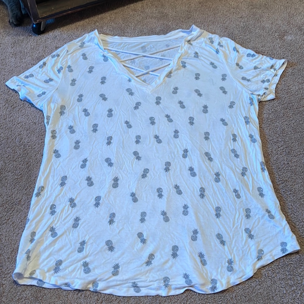 white shirt with pineapple design